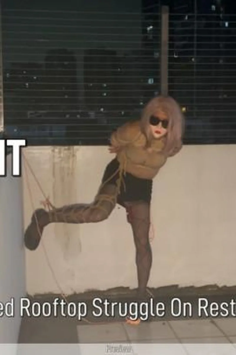 Tied Upright On The Rooftop - Crossdresser Bondage Struggle